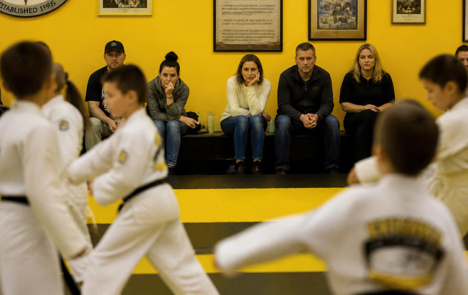 Parents watching class from the viewing area at Pride Martial Arts